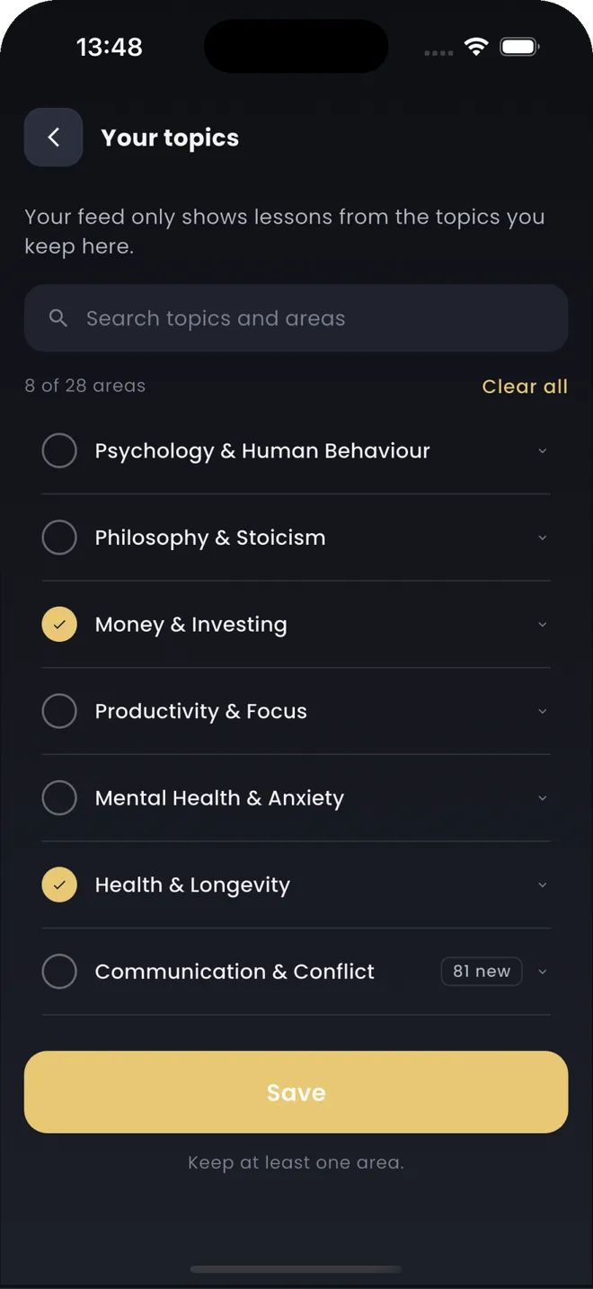 The Your topics screen: seven topics with round checkboxes, Money & Investing and Health & Longevity ticked, 8 of 28 areas kept, and a gold Save button.