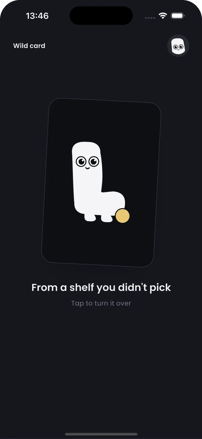 A wild card lying face down with L. on its back, captioned From a shelf you didn't pick, tap to turn it over.
